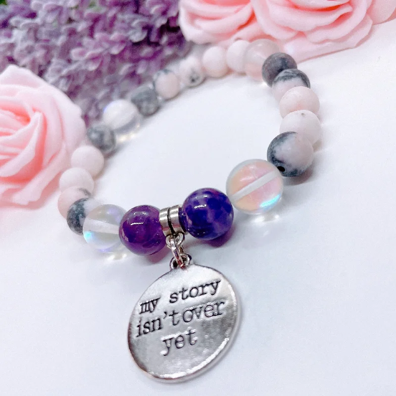 silver bracelet with inspirational symbols-My Story Isn't Over Classic Charm Bracelet Amethyst